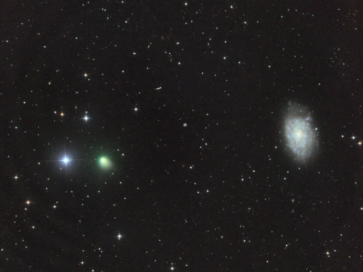 Comet C/2013 US10 Catalina and NGC 7793 by José J. Chambó, Siding Spring, NSW, Australia. Equipment: Planewave 20