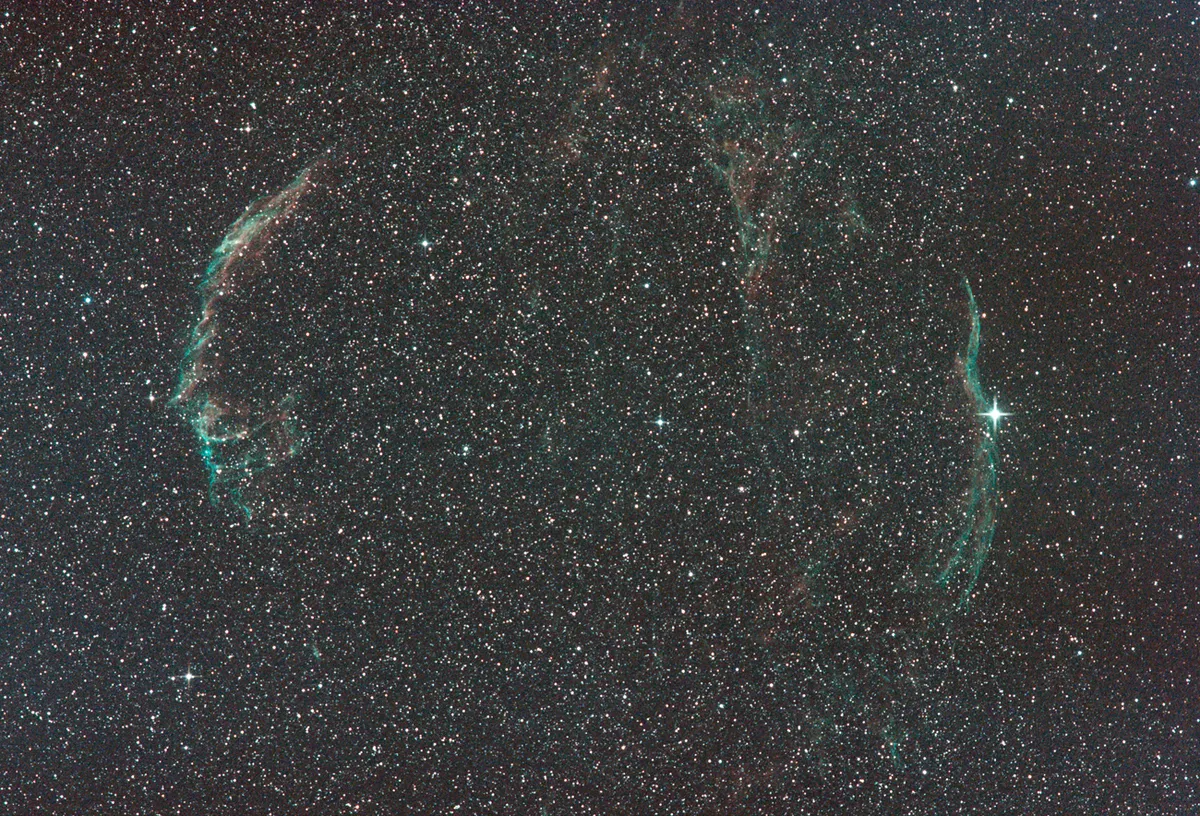 The Cygnus Loop by Matt Foyle, Derbyshire, UK. Equipment: Unmodified Canon t2i/550D, Astronomik CLS Clip filter, Nikon 300mm ED AF lens at F4, NEQ6 Pro mount, Orion 50mm mini guider, QHY5M