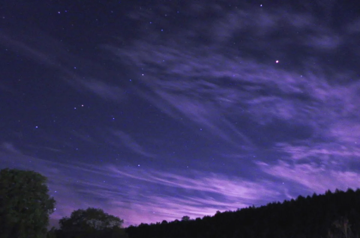 Arcturus shines brightly through the clouds in this image captured by Robin Buckmaster, Cenarth, Wales, 2011. Credit: Robin Buckmaster.