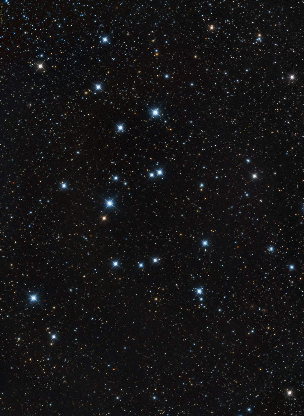 M39 is 800 light years distant, and its stars are about 300 million years old. It has between 30 and 50 stars forming an attractive triangular shape.