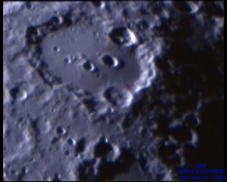 Clavious, Moon by Brian.M.Johnson, Hove, UK. Equipment: Meade LX200, Analog Video