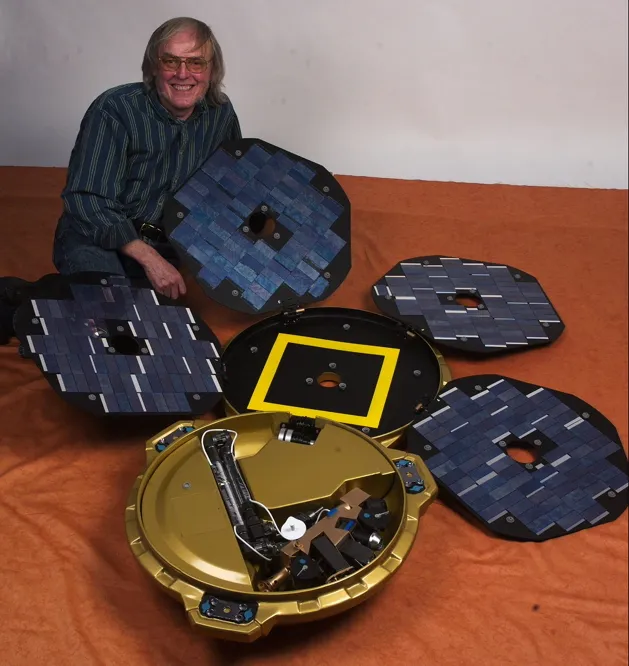 Colin Pilinger pictured with a model of the Beagle 2 spacecraft. Credit: All Rights Reserved Beagle 2