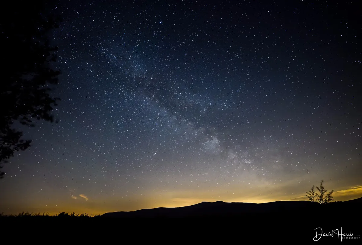 Milky Way over the Brecon Beacons by David Harris, Brecon Beacons Visitors Centre, Libanus, Brecon. Equipment: Nikon D800, 14mm f2.8Lens, Tripod