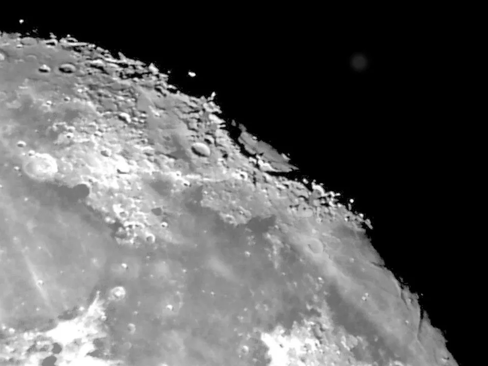 Nightfall Mare Crisium by Alan Stewart, Glenrothes, Fife, UK. Equipment: Skywatcher 150 PL, Orion Astrocam.