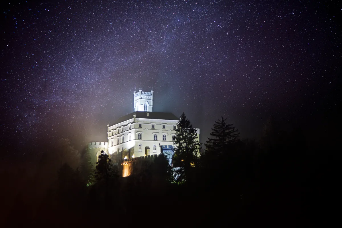 Trakoscan Castle under the Stars by Krunoslav Lisac, Trakoscan, Croatia. Equipment: Canon 5DSR, 24mm lens, iOptron Skytracker Pro.