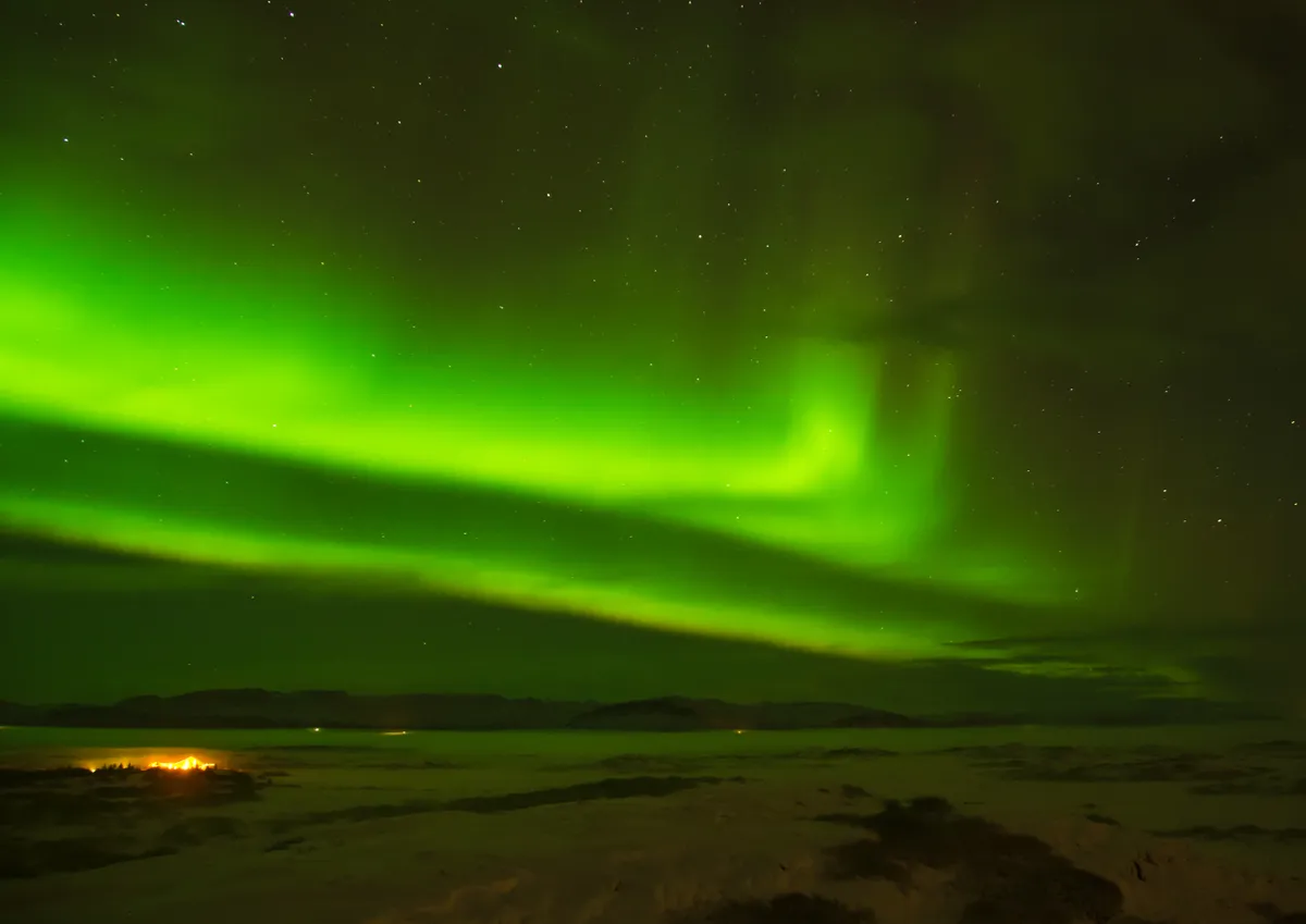 Northern Lights over Iceland Tom Howard, Borgarnes, Iceland. Credit: Nikon D7000 DSLR camera, Nikkor 18-200mm lens.