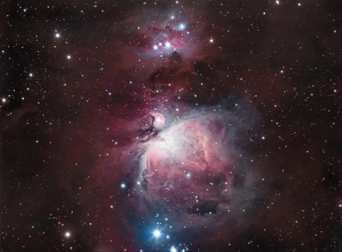 The Orion and Running Man Nebulae by David Slack, Prudhoe, Northumberland, UK. Equipment: Starlight xpress H9 mono CCD camera, Revelation 66mm ED refractor, Altair Astro 0.6 focal reducer, skywatcher HEQ5 pro mount, ZWO ASI 120mm based finder guider and Canon EOS1100D DSLR.