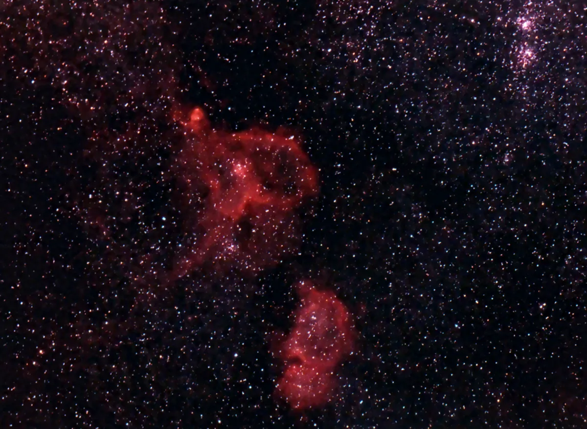 Heart and Soul by Martin Bailey, Gnosall, Staffordshire, UK. Equipment: Modified Canon 1000D, Astronomik CLS CCD, H alpha CCD clip in filters, Tamron A15 LD DiII 55-200 lens, Celestron CG5 mount.