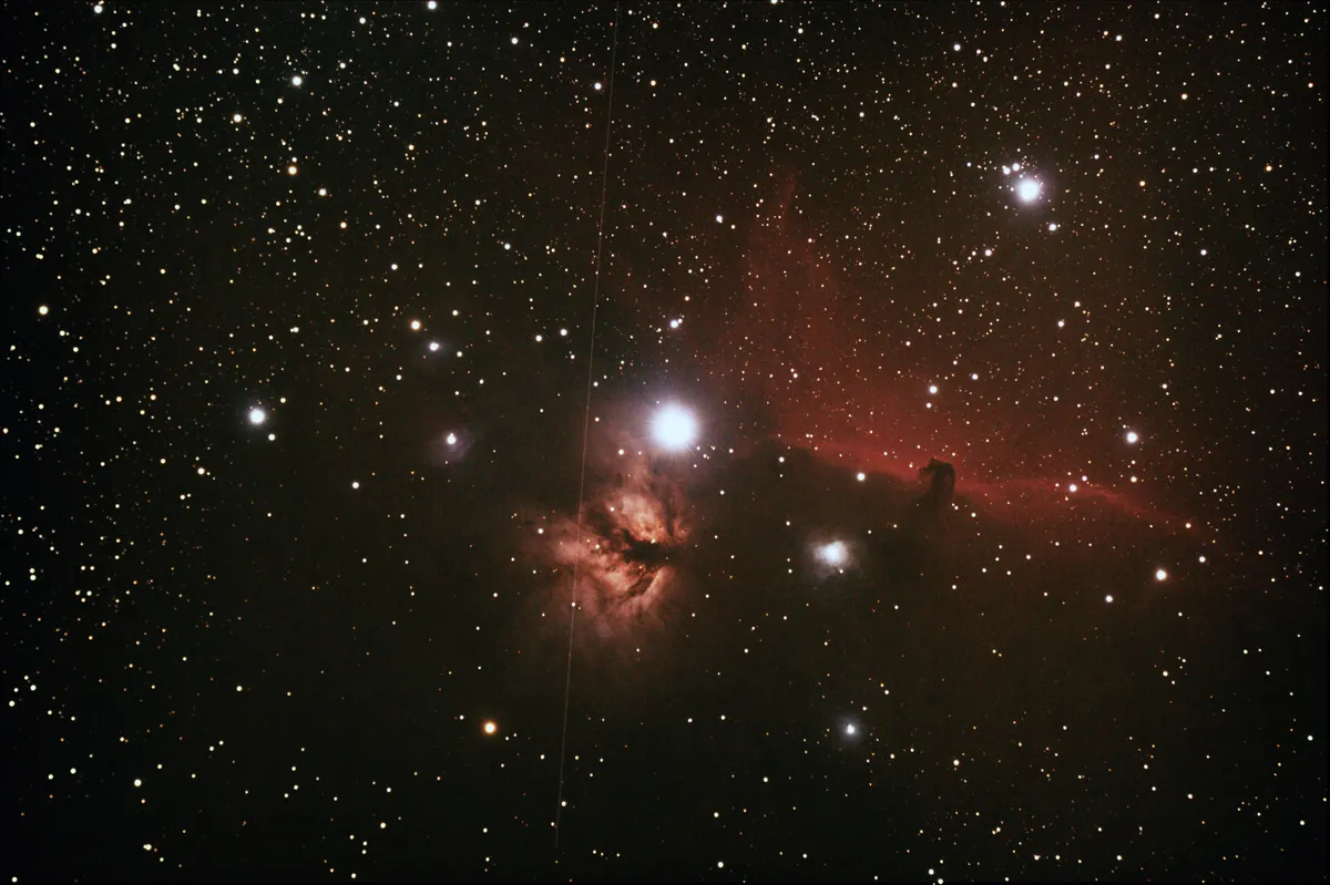 Horsehead with Trail by Robin Rice, Glenamour, Newton Stewart, UK. Equipment: Equinox 80Pro, HEQ5 mount, modified Canon EOS 50D