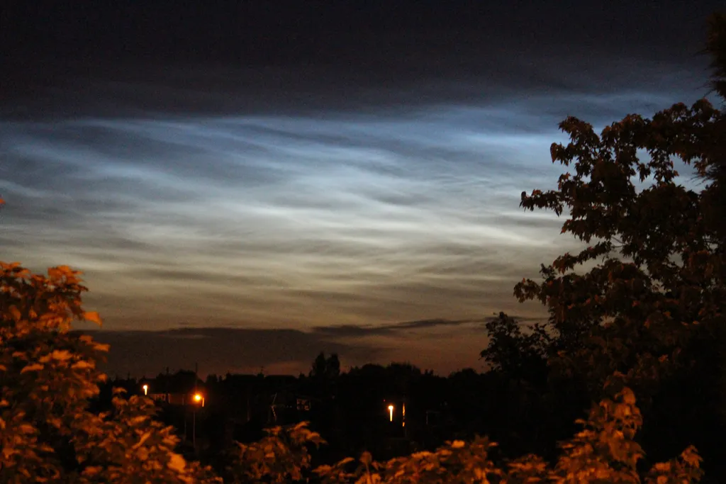 Noctilucent Clouds Over Leicester by Colin Berridge, Leicester, UK. Equipment: Canon 650D/Rebel, 55-250mm lens.