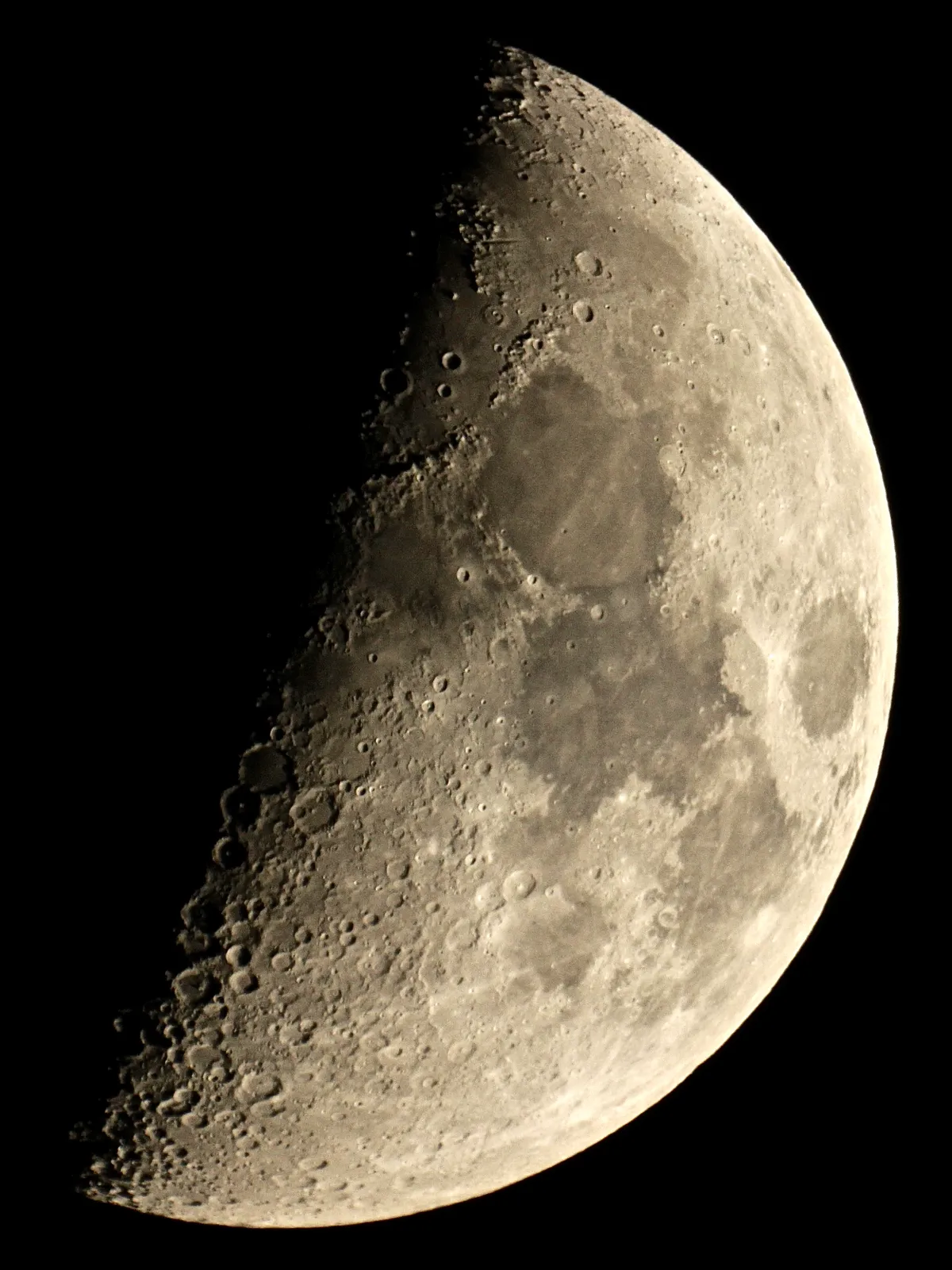 First Quarter Moon by Sarah & Simon Fisher, Bromsgrove, Worcestershire, UK. Equipment: Canon 600D, Mak 127mm telescope