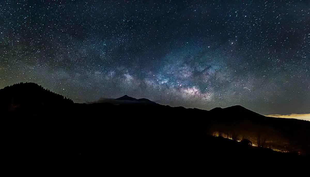 The Milky Way Rising over Tenerife by Peter Louer, Tenerife. Equipment: Canon 600D Astro modified, Samyang 10MM Lens.