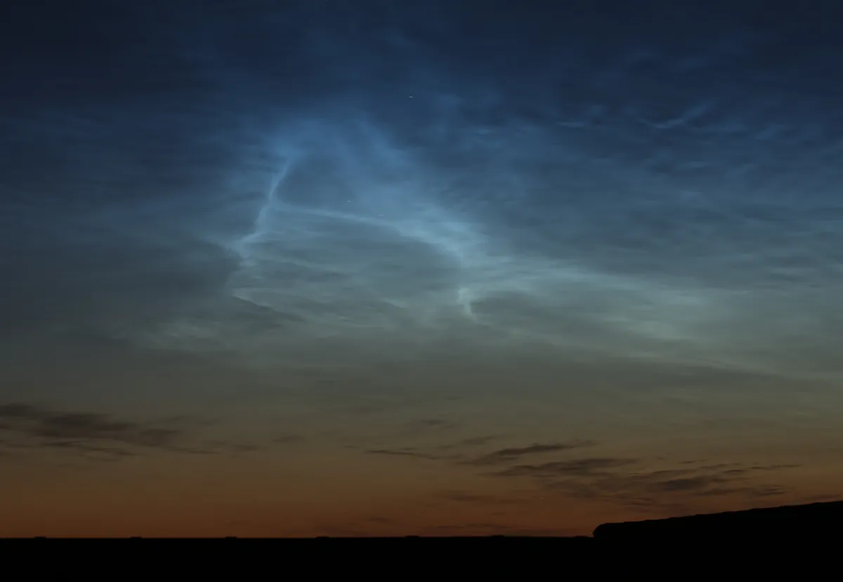 Noctilucent Cloud over Scotland by Elizabeth Legere, Bonnybridge, Scotland. Equipment: Canon EOS 5D MK III