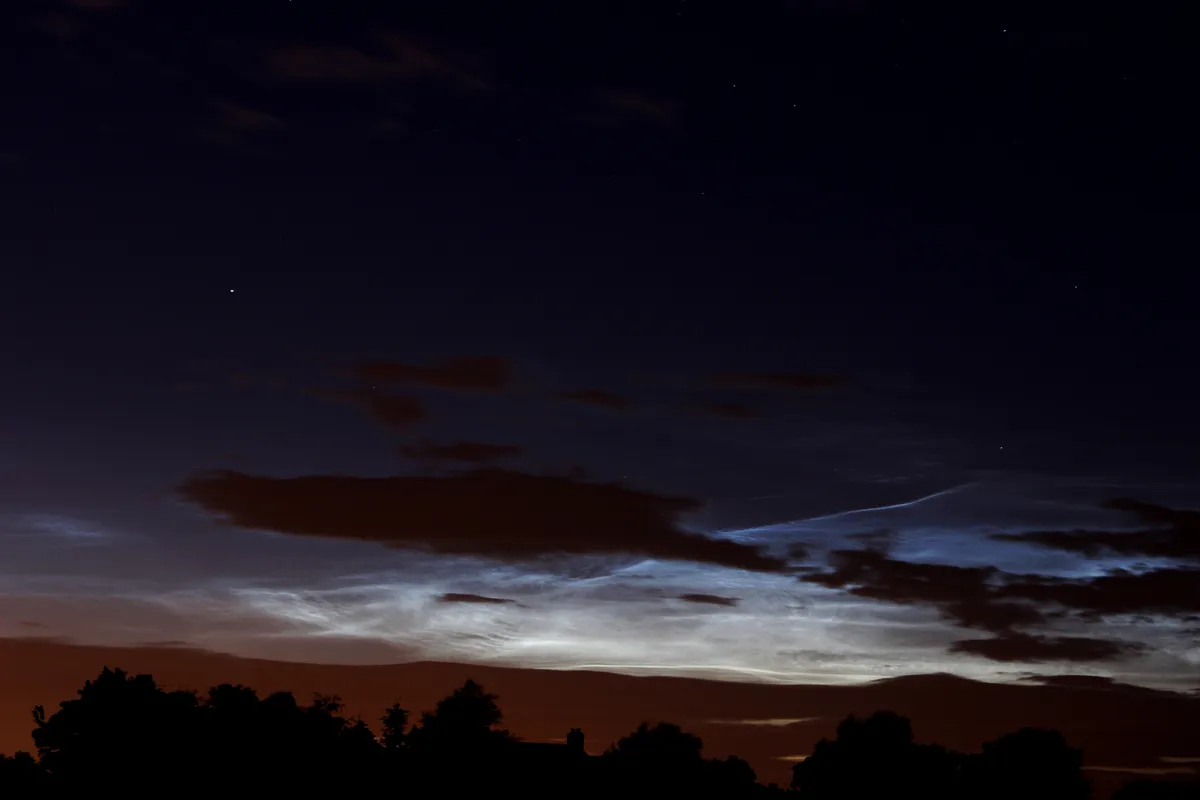 Noctilucent Clouds by Steve Brown, Stokesley, N. Yorkshire, UK. Equipment: Canon 600D, f/5.6.
