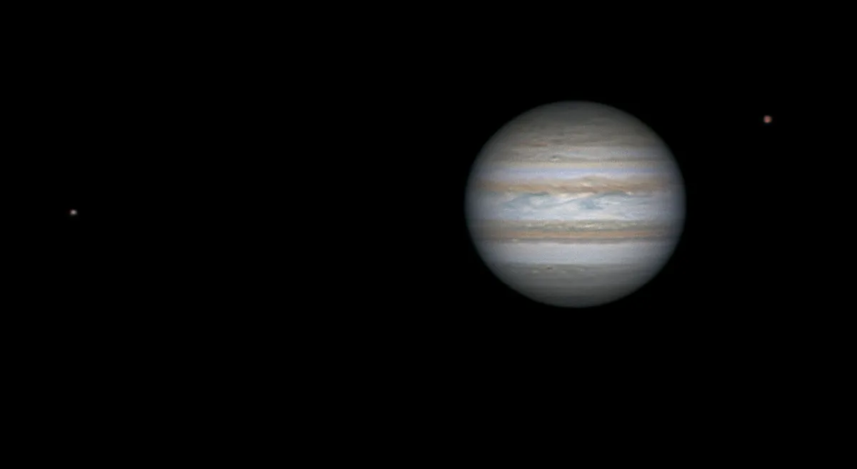 Jupiter, Io and Callisto by Jim Thurston, London, UK. Equipment: Celestron 9.25" SCT, EQ6, DMK21 mono CCD, RGB filters.