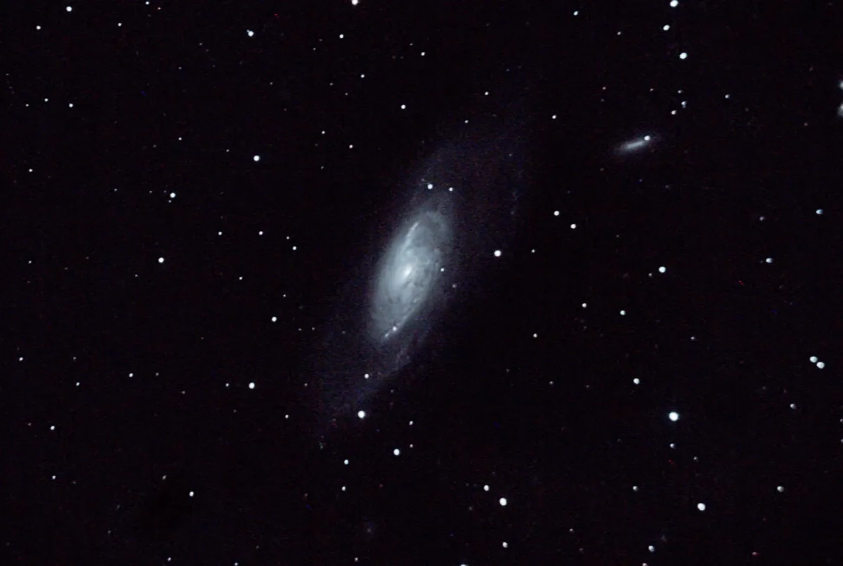 Messier 106 by Paul Hutchinson, Torquay, UK. Equipment: Skywatcher Explorer 200p, Canon 1100D, HEQ5, SkyWatcher 50mm/162mm Finderscope, QHYCCD qhy-5 II, Astronomik CLS Canon EOS Clip