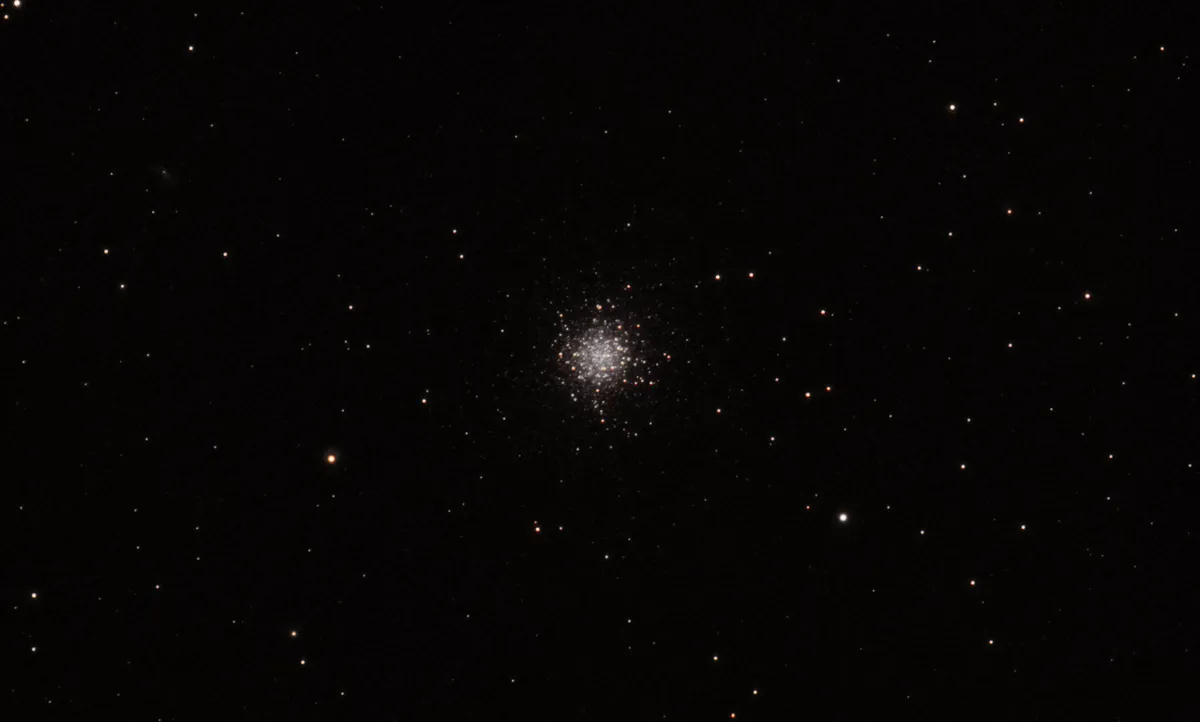Hercules Globular Cluster by Stacey Downton, Birmingham, UK. Equipment: Skywatcher Evostar 80ED DS pro on a Skywatcher EQ5 pro mount. Camera used was a Canon 200D unmodified with Skytech CLS filter.