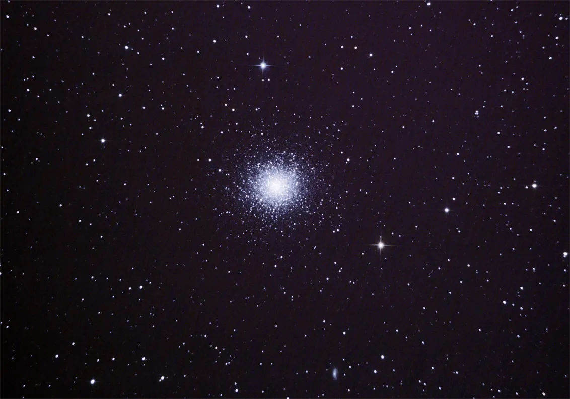 M13 - Great Globular Cluster in Hercules by Danny Lee, Kent, UK. Equipment: Skywatcher Explorer 150p, EQ5 pro GOTO mount, Nikon D40 DSLR (unmodified)