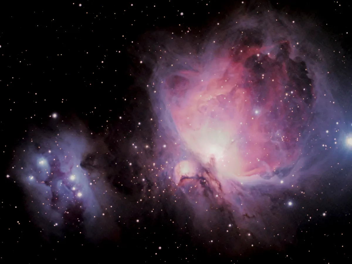 The Great Orion Nebula and Running Man Nebula by Tom Bishton, Brisbane, Australia. Equipment: Black Diamond ED120, AZEQ6 Mount, ST80 Guidescope, Synguider, 600D camera (modded)