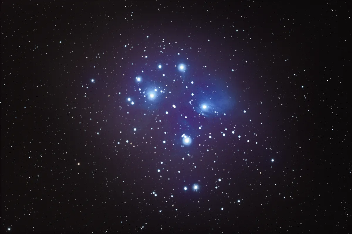 M45 The Pleiades Star Cluster by Martin Pyott, St Andrews, UK. Equipment: Lunt Engineering Refractor, 0.8x FF/FR, Skywatcher EQ-5 mount, Skywatcher WI-FI Adapter (unguided), Baader modified and cooled Canon 600D