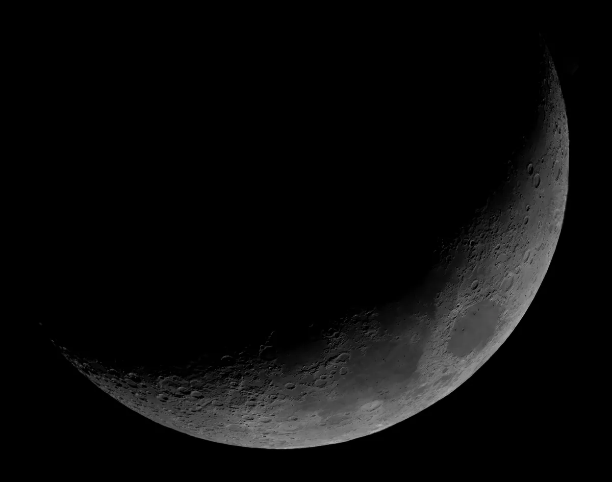 Crescent Moon Mosaic by Luke Oliver, Bedford, UK. Equipment: SPC 900NC, 2x Barlow Lens, Baader IR-Pass (685nm) Filter, Sky-Watcher Explorer-200, Registax 6.