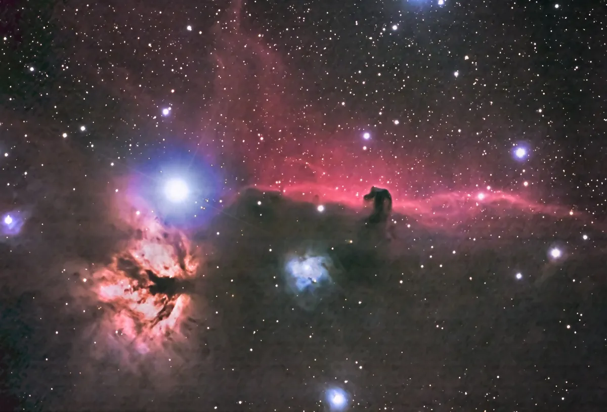 Horsehead and Flame Nebula by Tom Bishton. Equipment: ED120 Black Diamond Refractor, AZEQ6 Mount, ST80 Guidescope, Synguider, Modded Canon 600D camera