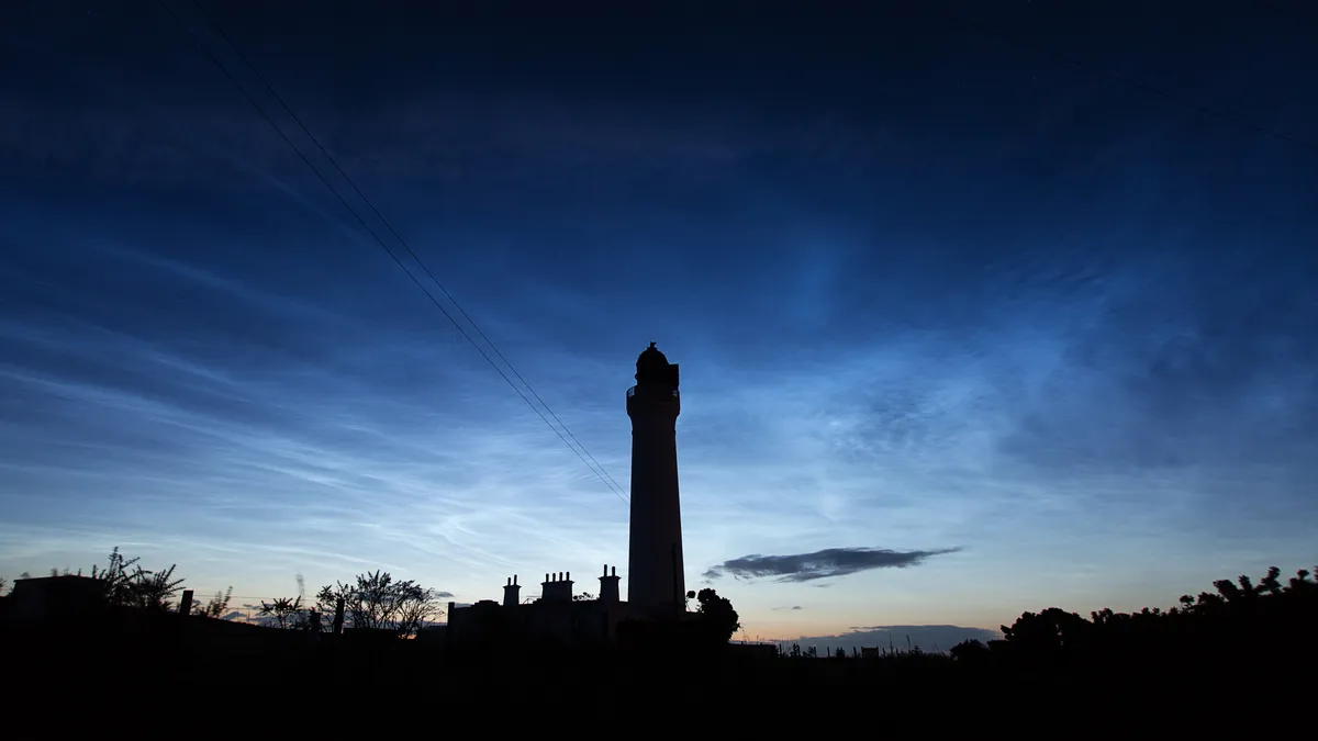 NLC over the Covesea Lighthouse by Alan C Tough, Lossiemouth, Scotland, UK. Equipment: Canon EOS 5D Mark III, Sigma EX DG 20mm lens, Manfrotto tripod.