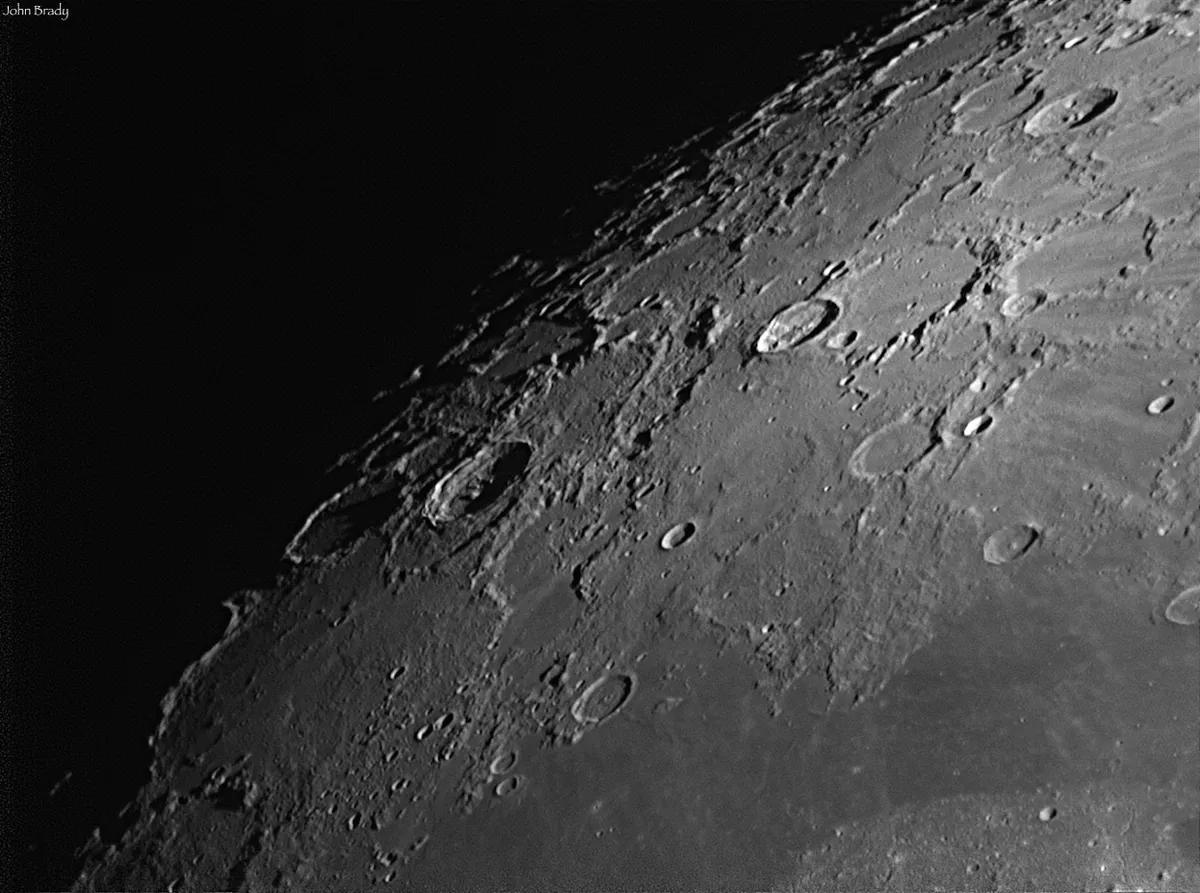 Philolaus Crater in Half Shadow by John Brady, UK. Equipment: Skywatcher 200p, DMK41 mono camera, X3 Barlow