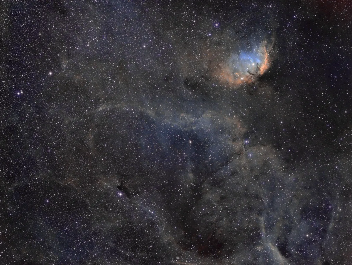 Sh2-101 Tulip Nebula by Richard Cardoe, Longstanton, UK. Equipment: SW Evostar ED80 DS-PRO, SW 0.85 reducer, HEQ5 PRO Synscan, Rowan Belt Drive mod, Atik 383l  Mono CCD, Baader 36mm 7nm Ha, 8.5nm OIII and 8nm SII filters, ZWO ASI120MM, Orion 162mm/F3.2 guidescope, PHD2