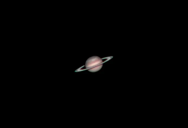 Saturn and it's Serpent Storm by Tom Howard, Crawley, West Sussex, UK. Equipment: Meade 127mm refractor, EQ6, Celestron NexImage.