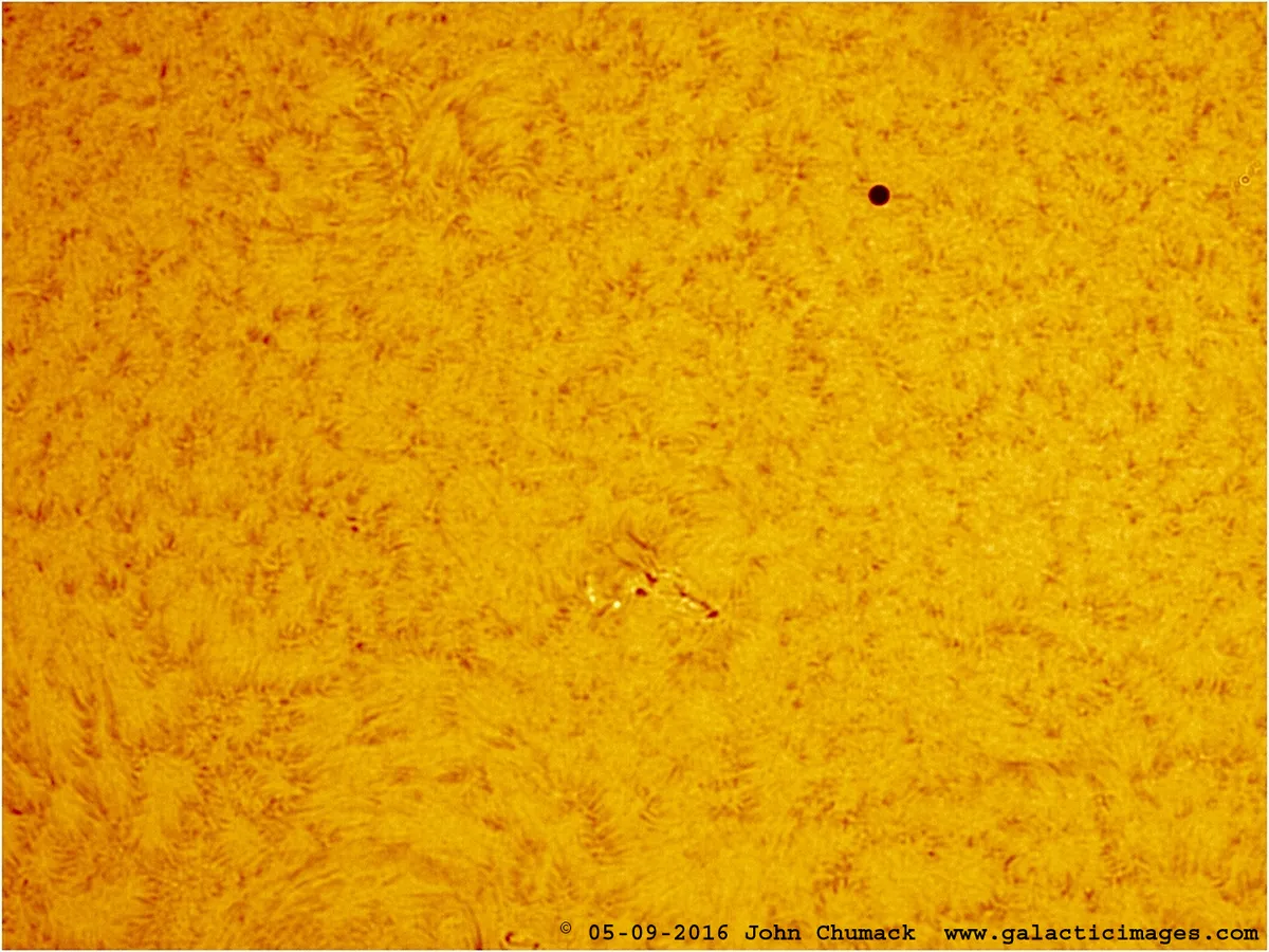 Mercury Transit near Sunspot #2543 by John Chumack, Lake Erie, USA. Equipment: Lunt 60mm/50F HA scope, QHY5IIL CCD camera, 2x barlow.