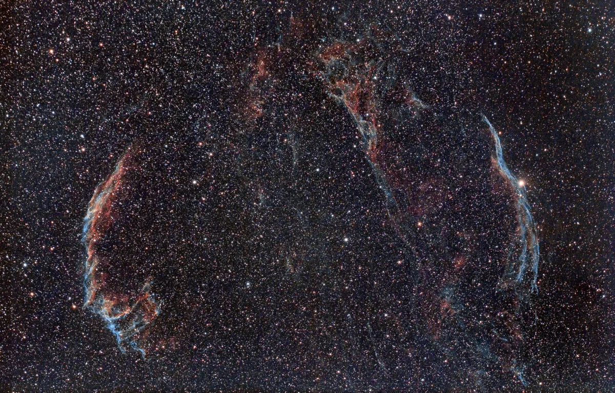 The Veil Nebula by Davy Cannon, Hamilton, Scotland, UK. Equipment: Altair Astro Starwave 70ED triplet APO travel refractor, Altair Planostar v2 0.8 reducer, Canon EOS 60Da DSLR, Astronomik UHC clip-filter, NEQ6 Pro mount.