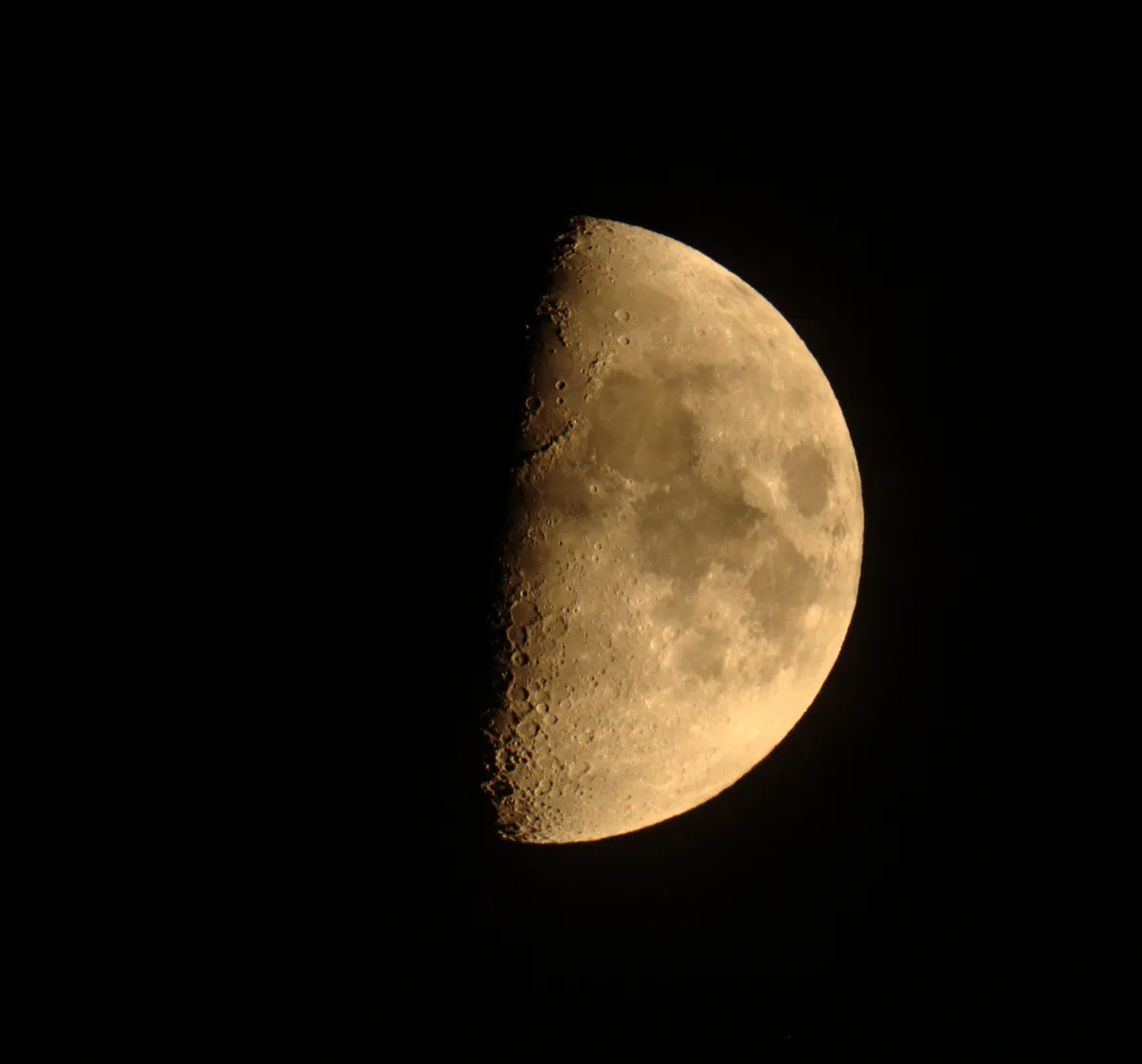 First ever lunar shot by Raymond Burling, Isle of Dogs, London, UK. Equipment: Canon 550D, SW80ED (Prime Focus)