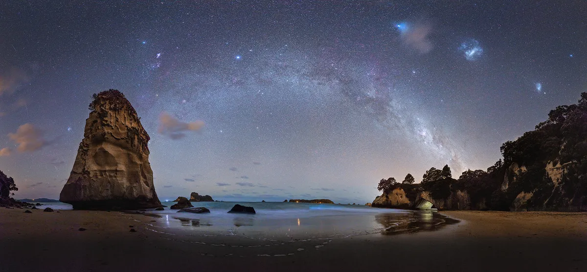 The Milky Way above Cathedral Cove by Alex Conu, Cathedral Cove, Coromandel, New Zealand. Equipment: Canon EOS 5D Mark III, Zeiss Otus 28mm f/1.4 APO Distagon T*