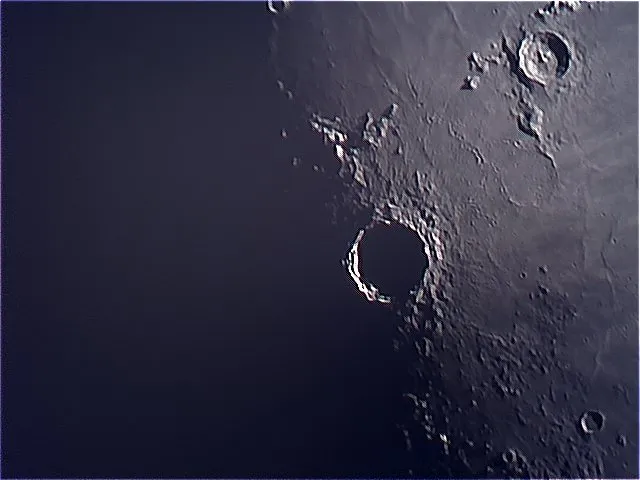 Copernicus at Sunrise by John Hall, Belfast. Equipment: 130mm F9 refractor, 4x barlow, SPC 900 Philips webcam