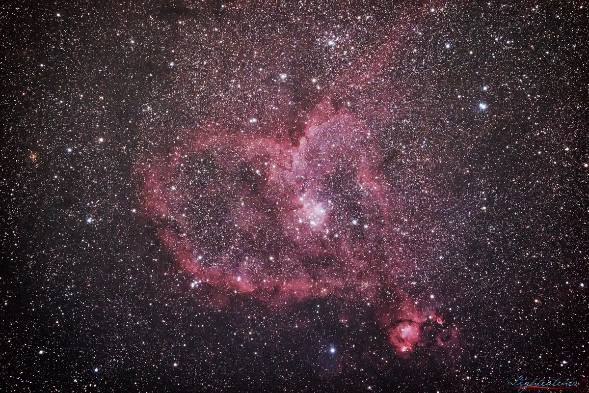 The Heart Nebula, IC 1805, Sharpless 2-190 by Mariusz Szymaszek, Crawley, UK. Equipment: Evostar 80ED DS-Pro w/ field flattener, HEQ5Pro, Sony A7S unmodded, Skywatcher SynGuider, Panagor 400mm lens, Optolong L-Pro (L-Professional) 2" filter.