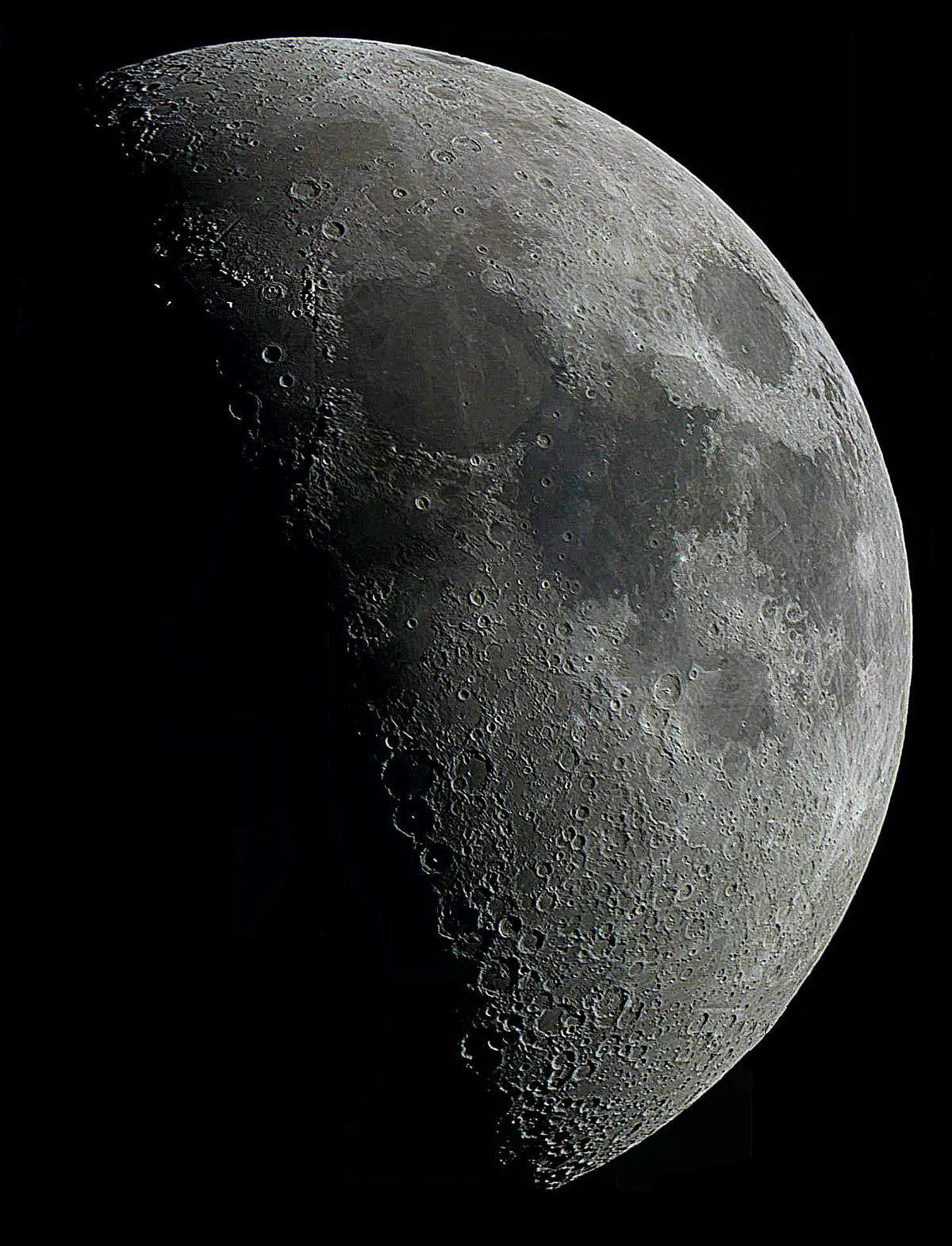 First Quarter Moon by Michael Fennings, London, UK. Equipment: Celestron 130EQ, Phillips 880 (flashed to 9800).