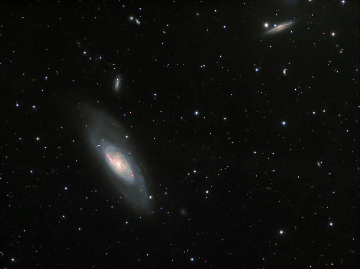 M106 and its Neighbours by André van der Hoeven, Wateren, The Netherlands. Equipment: Takahashi FSQ106, NEQ-6, SXV-H9 CCD camera