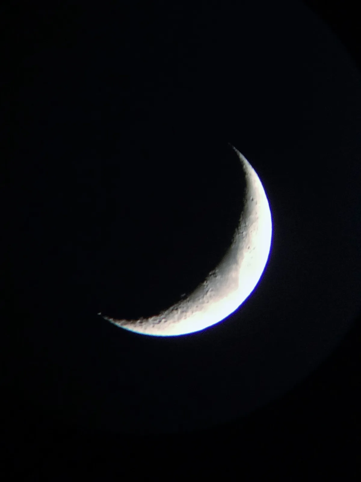 Winter Crescent Moon by Martin Davies, Bridport, Dorset. Equipment: Celestron Travel Scope 70, iPhone 5s.