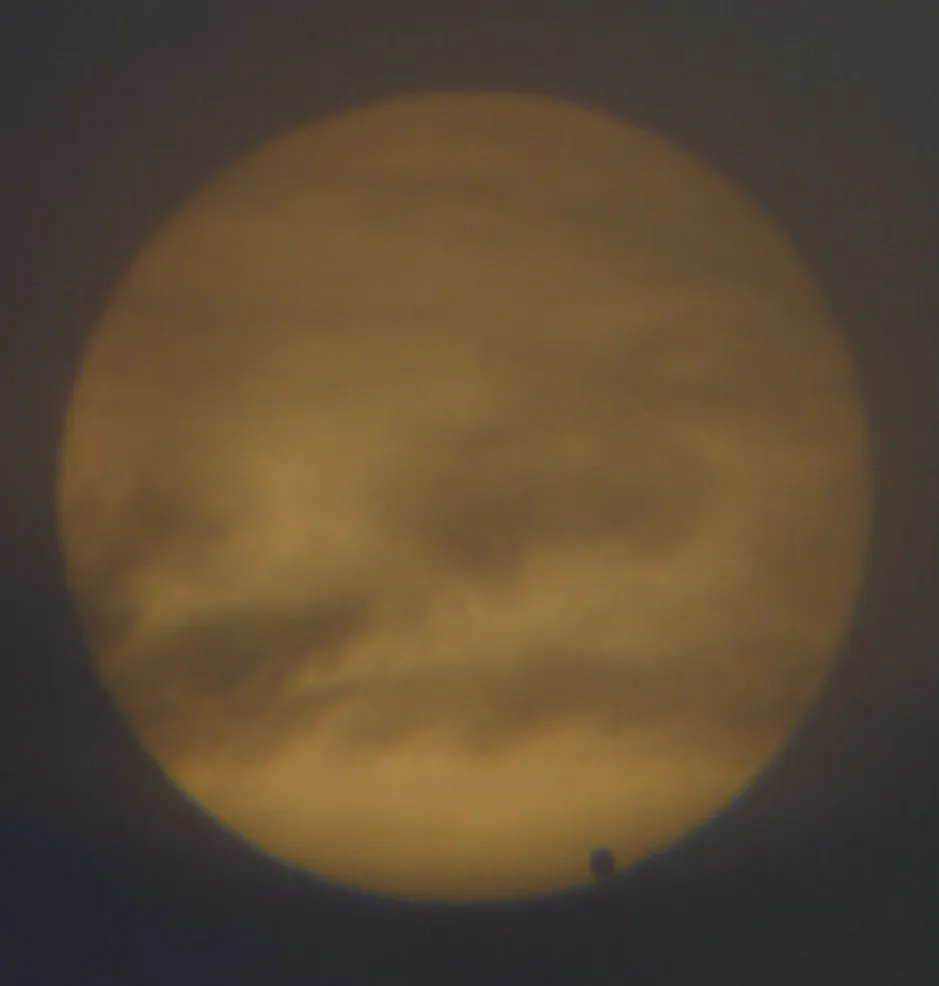 Transit of Venus from southern France 6th June 2012 06:38am by Bobdobolina, Southern France. Equipment: 80mm Camlink spotting scope, DMC-LX5, Sheet of A4