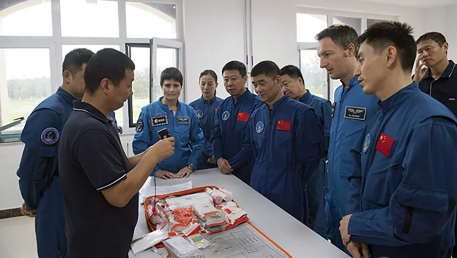 ESA astronauts Samantha Cristoforetti and Matthias Maurer are briefed ahead of their sea survival training with Chinese colleagues in Yantai, China, 14 August 2017. Credit: ESA–Stephane Corvaja, 2017
