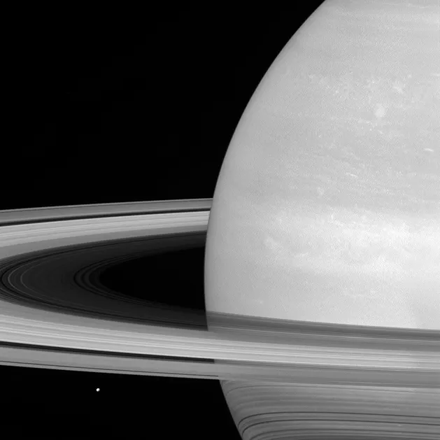 A view of Saturn’s rings captured by the Cassini spacecraft on 21 July 2016. Just below rings can be spotted Saturn’s tiny moon Mimas. Credit: NASA/JPL-Caltech/Space Science Institute