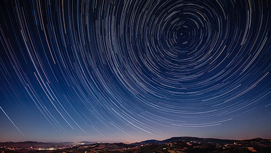 Star trails make for an impressive astrophoto. Image Credit: iStock