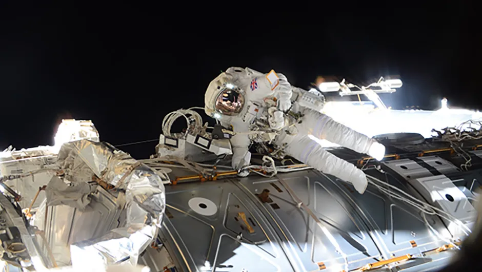 eake floats outside the ISS during his 4 hour 43 minute spacewalk to replace a failed power regulator and install cabling. Credit: ESA/NASA
