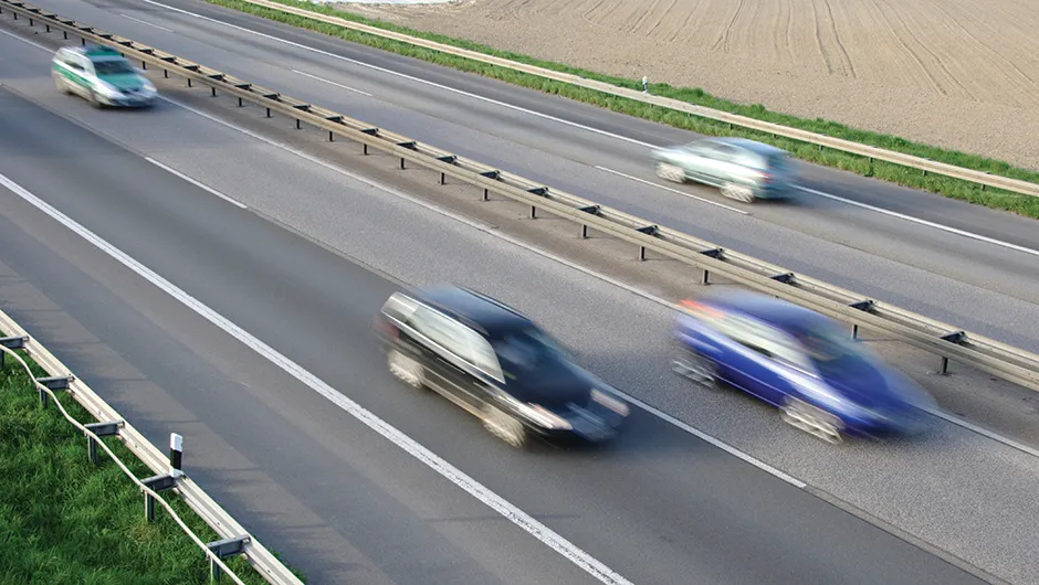 Passing cars on a motorway appear slower to each other than to everyone else Credit: Science Photo Library