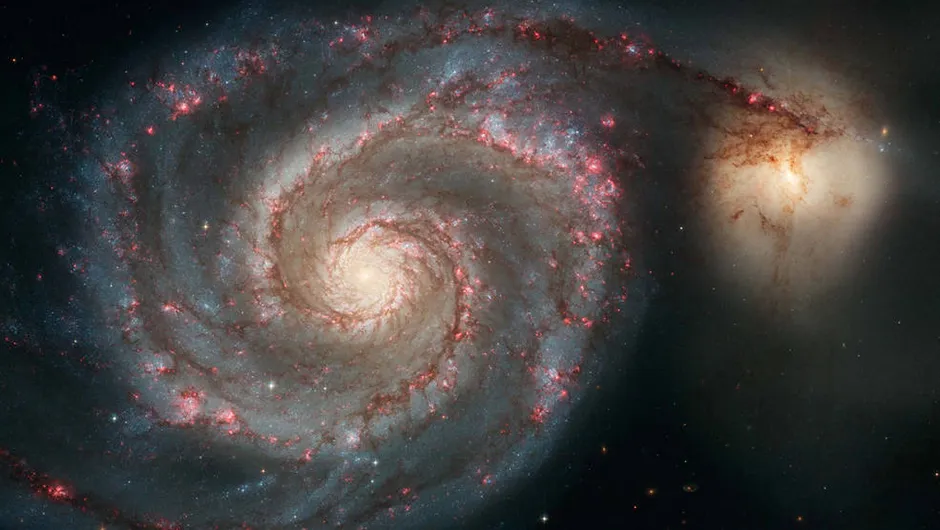 Messier 51, also known as the Whirlpool Galaxy, is one of the most famous examples of a beautiful spiral galaxy. Credit: NASA, ESA, S. Beckwith (STScI) and the Hubble Heritage Team (STScI/AURA)