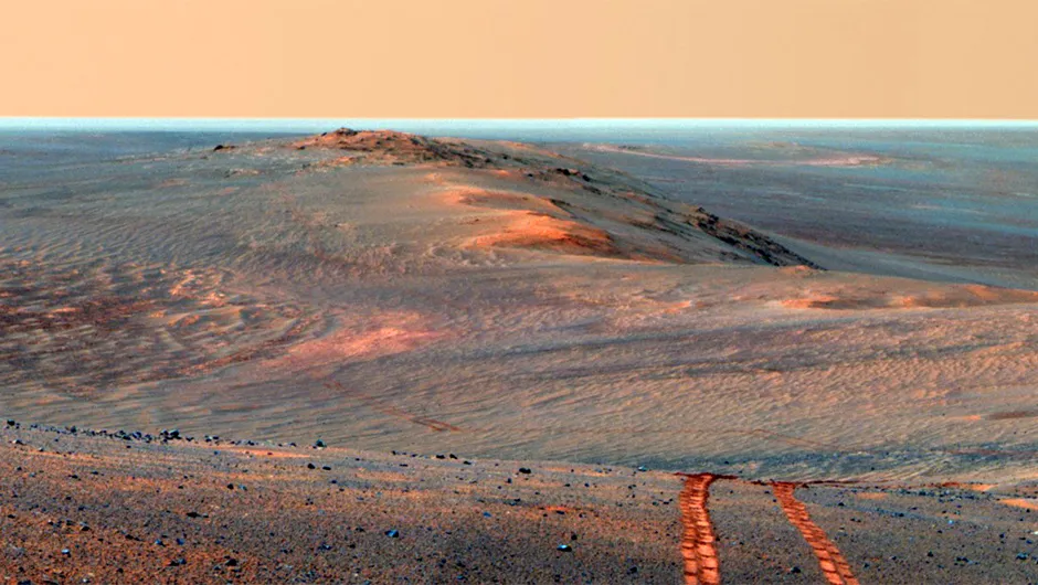 A dramatic Martian landscape captured by Opportunity as it looked back towards part of the west rim of Endeavour Crater during the summer of 2014. Credit: NASA/JPL-Caltech/Cornell/ASU