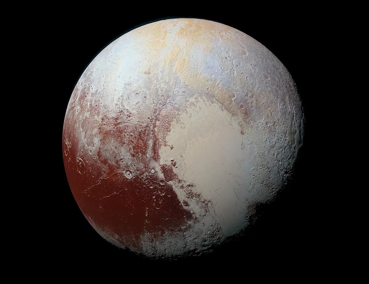 New Horizons' study of Pluto revealed methane ice dunes and atmospheric gases like methane, nitrogen and carbon dioxide, just the same as other known Kuiper Belt objects. Credit: NASA/JHUAPL/SwRI