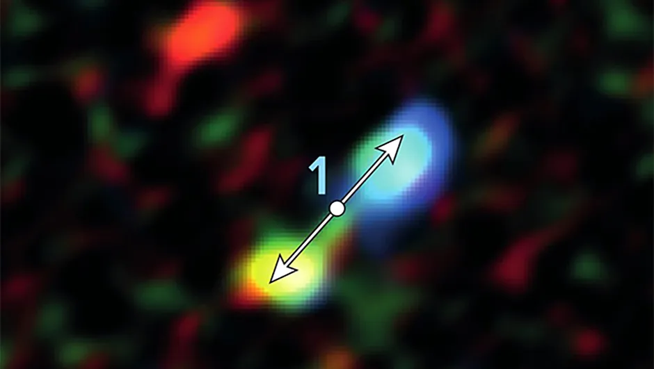 A double-lobe feature produced by jets from one of the newly forming stars.Credit: ALMA (ESO/NAOJ/NRAO), Yusef-Zadeh et al.; B. Saxton (NRAO/AUI/NSF)