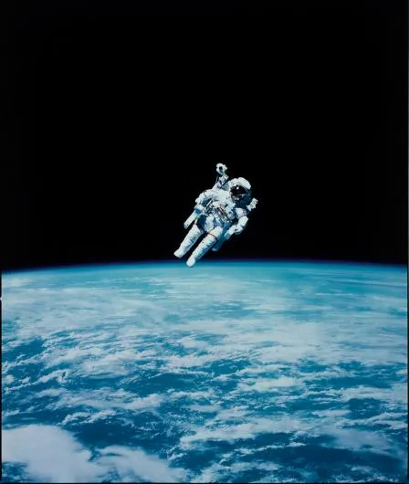 Astronaut Bruce McCandless makes the first ever untethered spacewalk with the aid of his nitrogen jet propelled backpack, February 1984.